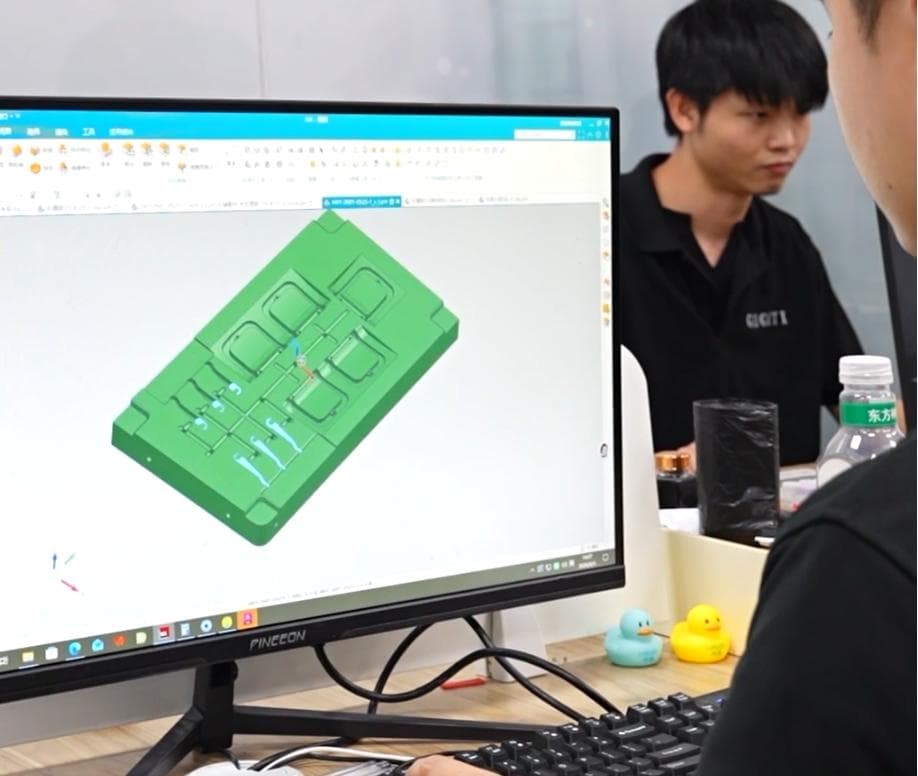 FKY designer reviewing a custom belt development drawing